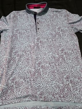 Greyson"Den of Thieves" men's golf polo in a blue and purple wolf print